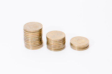 Three coins on white