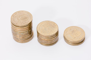 Three coins on white