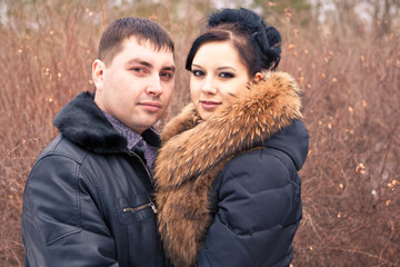 Fototapeta premium sensual portrait of a young couple in the cold winter