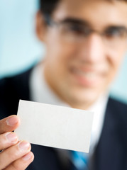 Businessman showing business card