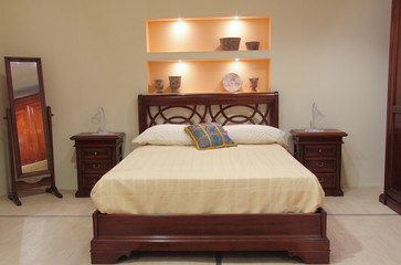 Classic bedroom with elegant wooden furniture