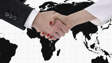 Handshake with map of the world in background