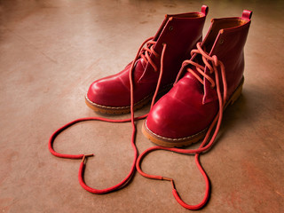 Fototapeta na wymiar Red shoes with heart.