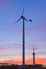 Fototapeta na wymiar wind turbine on sunset background
