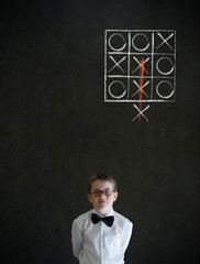 Boy thinking out of the box tic tac toe concept