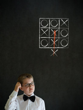 Boy Thinking Out Of The Box Tic Tac Toe Concept