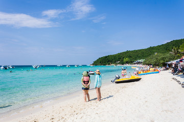 Tourist on the beach looking to the sea