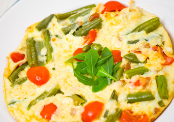 omelette with green beans and cherry tomatoes