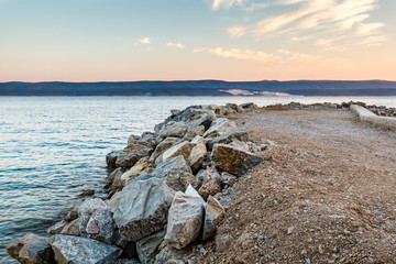 Breakwater on Makarska Riviera at Sunset, Croatia