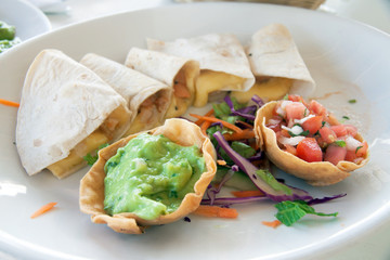 Mexican guacamole and enchiladas