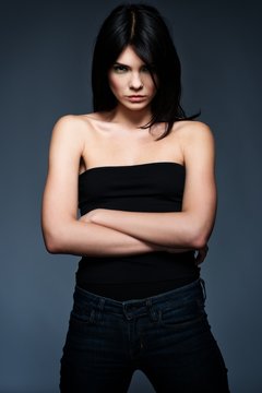 Young beautiful strict brunette woman 