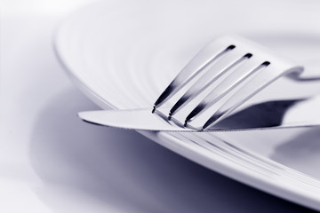 Knife and Fork on Plate Soft Focus