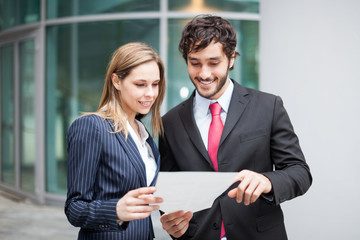 Business people reading a document