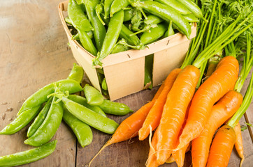 Fresh green peas and carrots