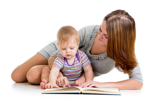 cute mother reading a book to her kid boy