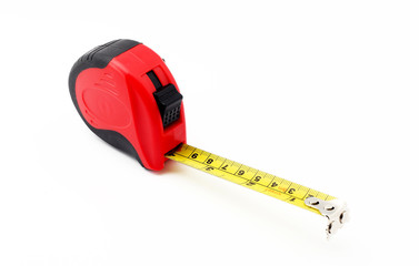 Tape measure over white background