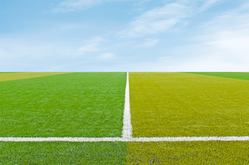 Obraz premium Artificial Soccer Field with blue sky