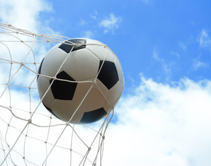 Naklejka premium soccer ball in goal