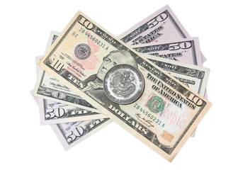 Chinese coin over dollars
