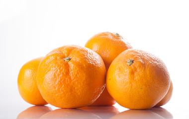 Citrus fruit. Tangerines on a white background.