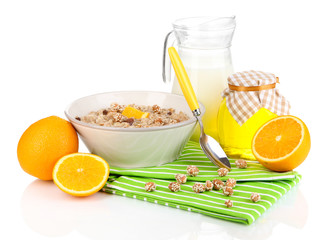 Useful oatmeal in bowl with fruit isolated on white