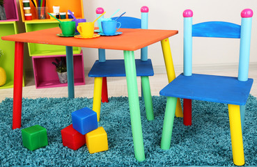 Fototapeta na wymiar Small and colorful table and chairs for little kids