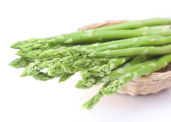 Fresh green asparagus on white background