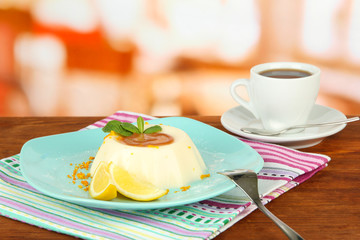 Panna Cotta with orange zest and caramel sauce,