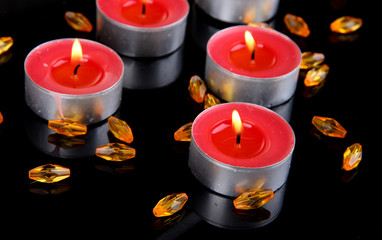 Candles isolated on black