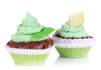 Delicious beautiful cupcakes isolated on white