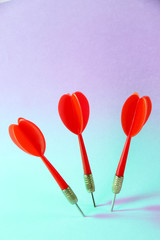Darts on blue background