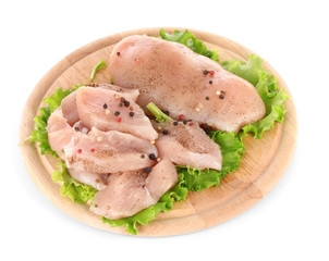 Chicken meat on board isolated on white