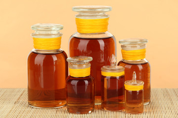 Medicine bottles on beige background