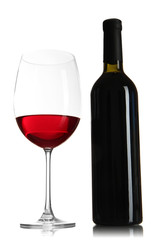 Glass of wine with bottle isolated on white
