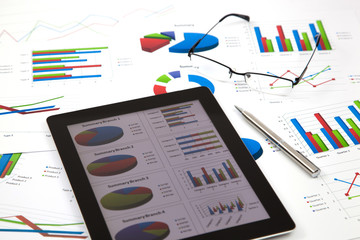 business workplace with stock market data