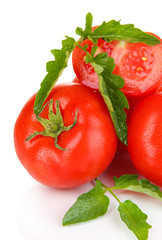 Ripe tomatoes isolated on white.