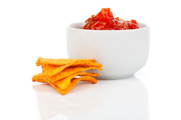 Nachos corn chips with fresh salsa isolated on white