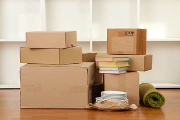 Moving boxes in empty room