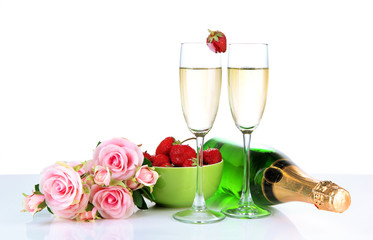 Romantic still life with champagne, strawberry and pink roses,