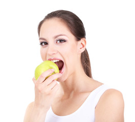 Young woman with apple isolated on white