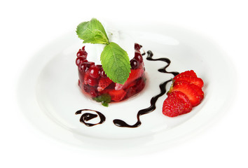 Tasty jelly dessert with fresh berries, isolated on white