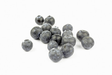 Close up of blueberries on the white background