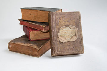Old books on a white background.