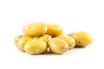 Fresh potatoes on a white background.