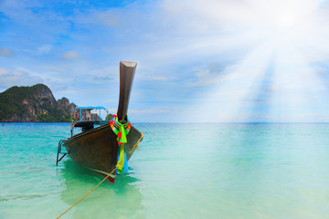 Longtail boat on the sea tropical beach