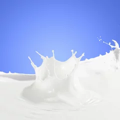 Wall murals Milkshake Pouring milk splash