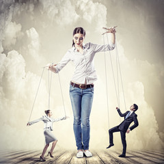 Businesswoman puppeteer