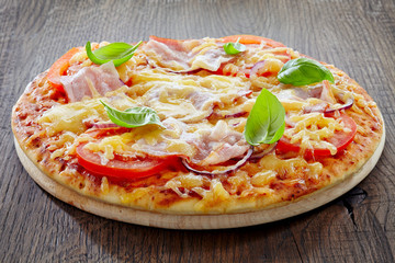 Pizza with bacon and tomato