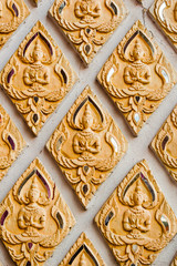 Low relief cement Thai style