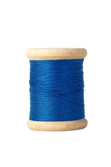 blue thread bobbin isolated on white
